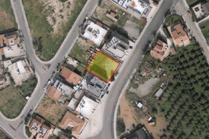 Aerial picture of the plot, square shape having access to the main road