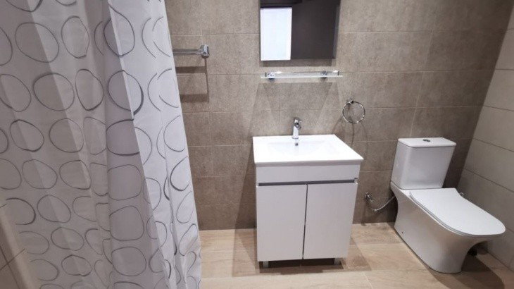 Renovated toilet and shower unit