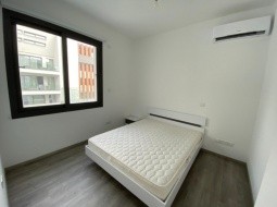 Picture of the second bedroom with one double bed, a/c, parquet flooring