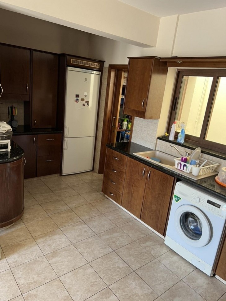 Picture of the kitchen area equipped with all the needed electrical appliances.