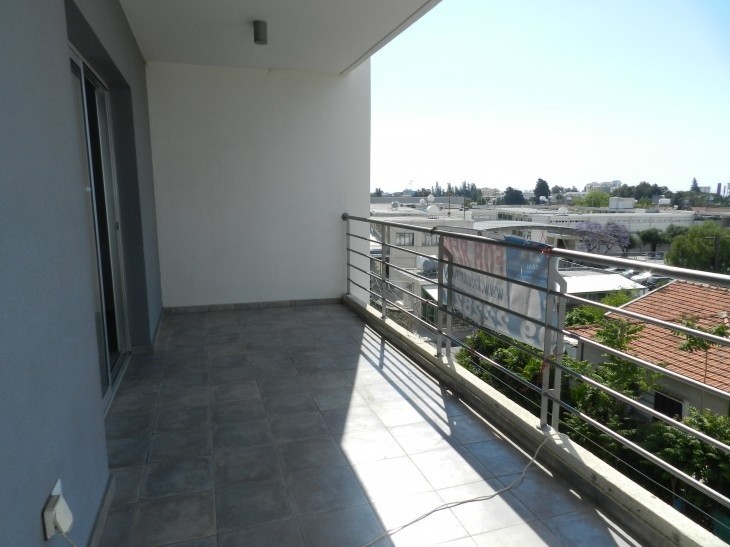 Picture of the covered veranda of the two-bedroom apartment.