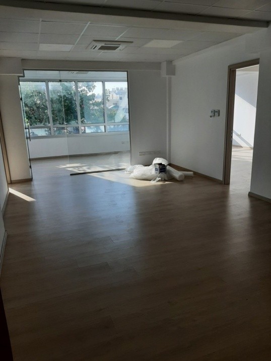 Office area unfurnished with large thermal windows